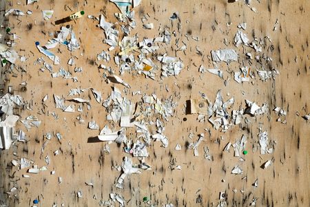 A brown background with pieces of paperの写真素材