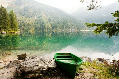 An image of a boat at beautiful lake の写真素材