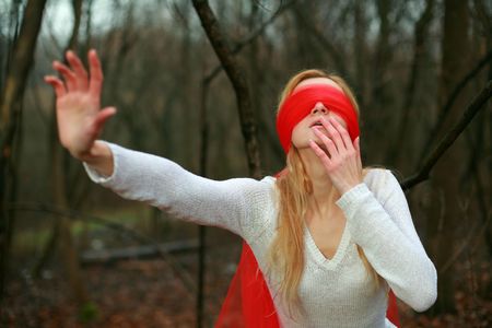 An image of woman with red blindfoldの写真素材