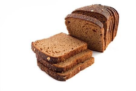 An image of slices of dark bread on white background