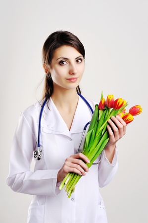 An image of doctor with tulipsの写真素材