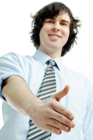 Happy young businessman ready to seal a dealの写真素材