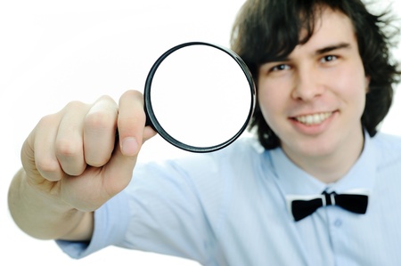 An image of a young man with a mafnifierの写真素材