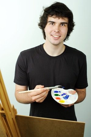 An image of a young painter drawing a pictureの写真素材