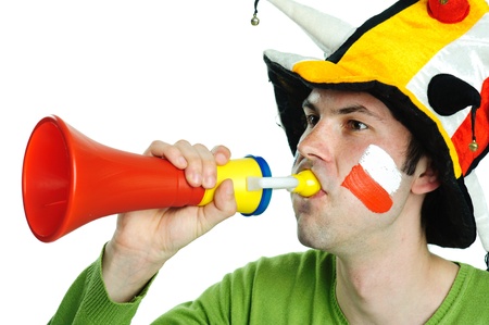 An image of soccer fanwith plastic trumpetの写真素材