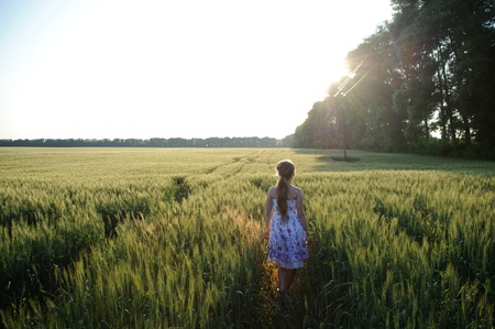 An image of a girl in the field