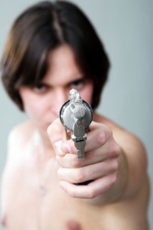 An image of man with plastic gunの写真素材