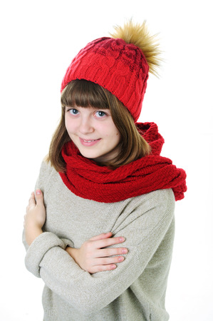 An image of pretty young girl in warm hat and scarfの写真素材