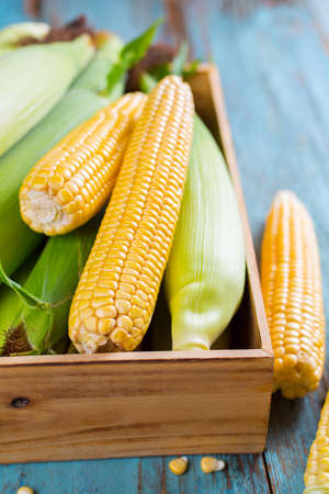 Corn box on wooden table