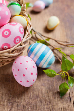 Easter eggs on a wooden surfaceの写真素材