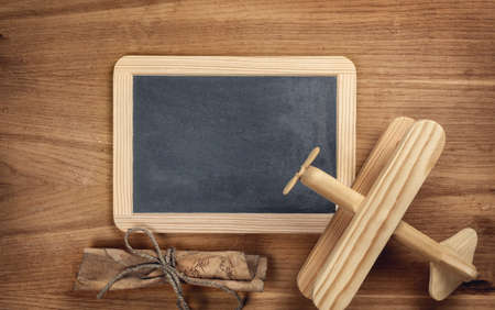 Toys for boys on vintage chalk board. Adventure or discovery concept. Top viewの写真素材