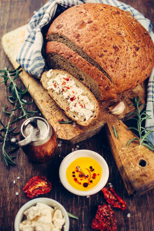 Traditional bread and spices on a dark background