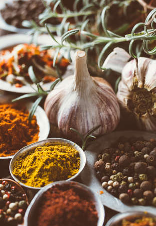 Cooking ingredients, spice in metal bowls. Toned imageの写真素材