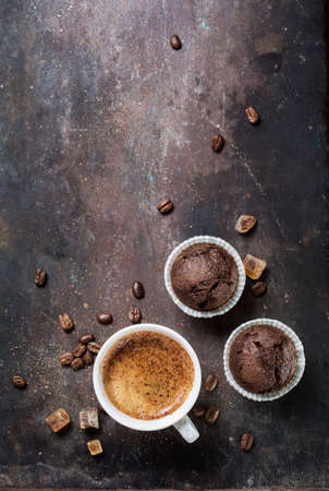 Fresh and tasty cupcakes and espresso. Food background with copyspaceの写真素材