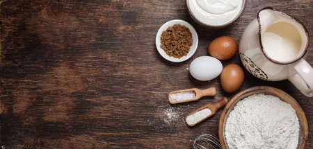 Traditional baking ingredients. Rustic background with free text space.の写真素材