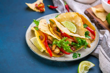 Mexican Food Chicken Tacos on a blue background.の写真素材