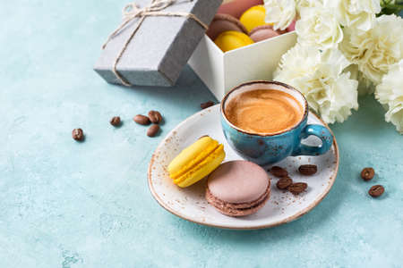 Cup of coffee with foam and macaroons. Valentines Day background or Womens day or Mothers dayの写真素材