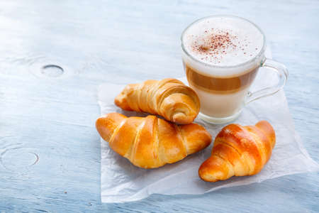 Breakfast with Latte macchiato coffee and croissants. Selective focusの写真素材