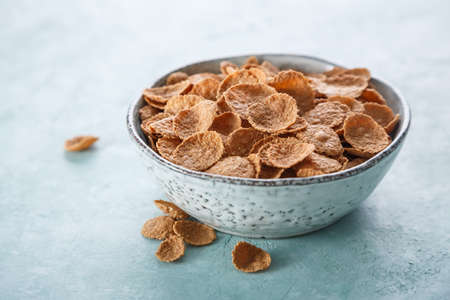 Bowl with Wholemeal Cornflakes. Wholesome breakfast. Selective focusの写真素材