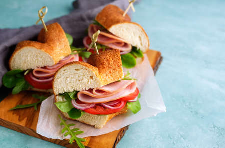 Sandwiches with ham and vegetables. Food backgroundの写真素材