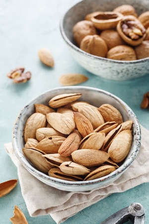 Bio organic almonds in a bowl, superfood. Selective focusの写真素材
