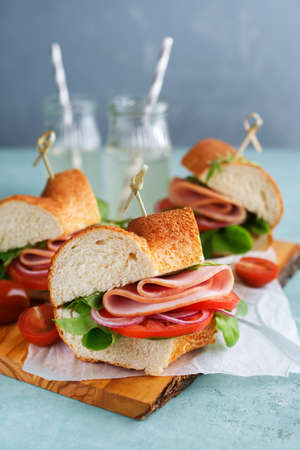 Sandwiches with ham with ham and tomatoes.の写真素材