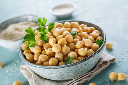 Sprouted chickpeas in the bowl, close-up. Healthy food. Vegetarian food.の写真素材