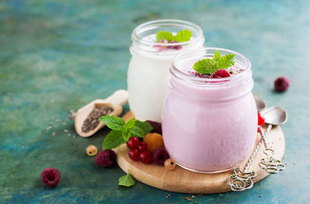 Natural Homemade Yogurt in a Glass jar with Berries and chia seeds, Selective focus, copy spaceの写真素材