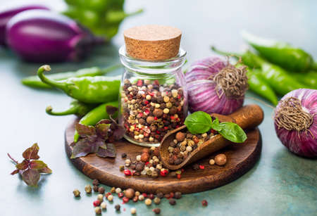 Pepper spice mix and hot pepper in pods, ingredients for cooking. Selective focusの写真素材