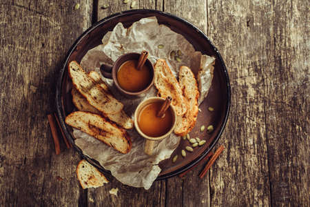 Spicy vegetable soup with toasted. Autumn backgroundの写真素材