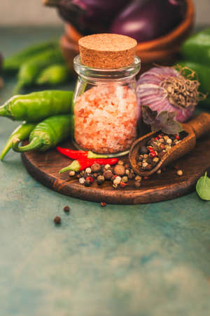Pink salt and spice, ingredients for cooking. Food background with copy space.の写真素材