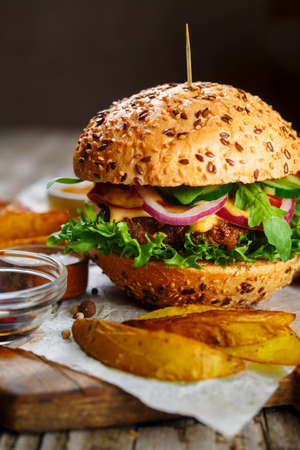 Tasty beef burger with lettuce and mustardの写真素材