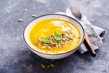 Spicy pumpkin soup with basil. Healthy eatingの写真素材