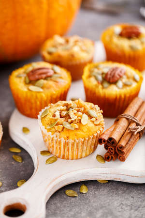 Homemade muffins of pumpkin with pecans. Autumn menuの写真素材