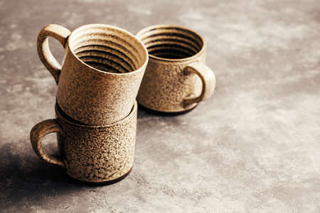 Empty ceramic coffee mugs wiht copy space, close-up.の写真素材