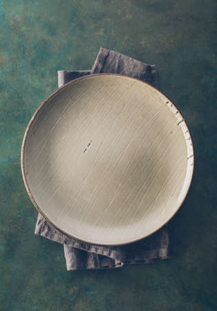 Empty ceramic plate. Background with copy spaceの写真素材