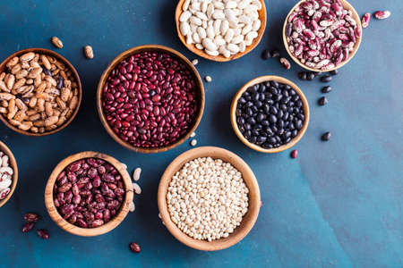 Assortment of beans on a blue background.の写真素材