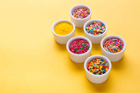 Sugar sprinkles, decoration for cake and ice-cream and cookies. Food background with copy space.の写真素材