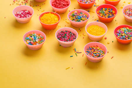 A lot of different sprinkles for cake and ice-cream and cookies.の写真素材