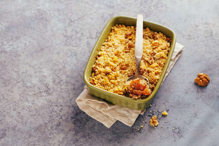 Freshly baked crumble with applesの写真素材