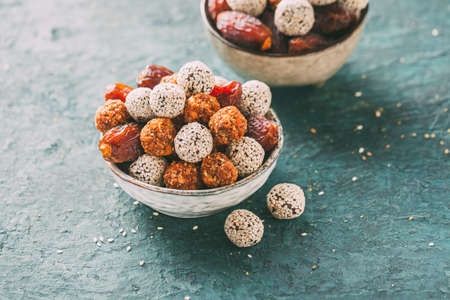 Healthy energy balls made of dried fruits and sesame.