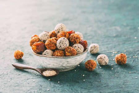 Healthy energy balls made of dried fruits and sesame.