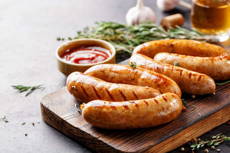 Sausages fried with spices and herbs, Selective focusの写真素材