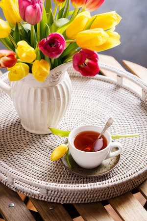 Colourful tulips and fresh teaの写真素材