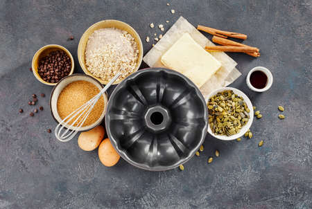 Cake pan with ingredients for bakingの写真素材