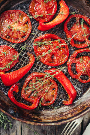 Oven-baked tomatoes with thymeの写真素材