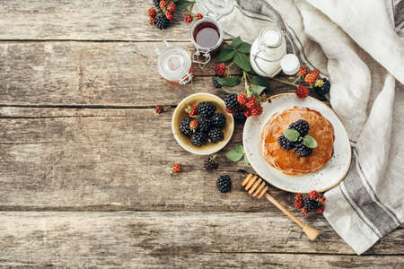 BlackBerry pancakes with fresh berriesの写真素材