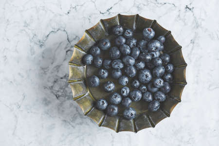 Fresh blueberries in a bowlの写真素材