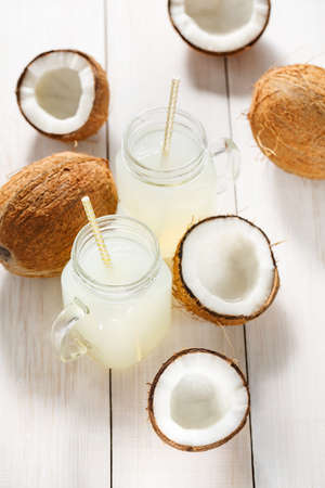 Refreshing chilled coconut water and coconuts.の写真素材