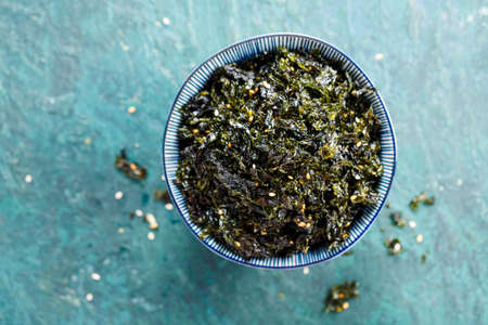 Seasoned Seaweed Snack. Top view. Food background with copy space.の写真素材